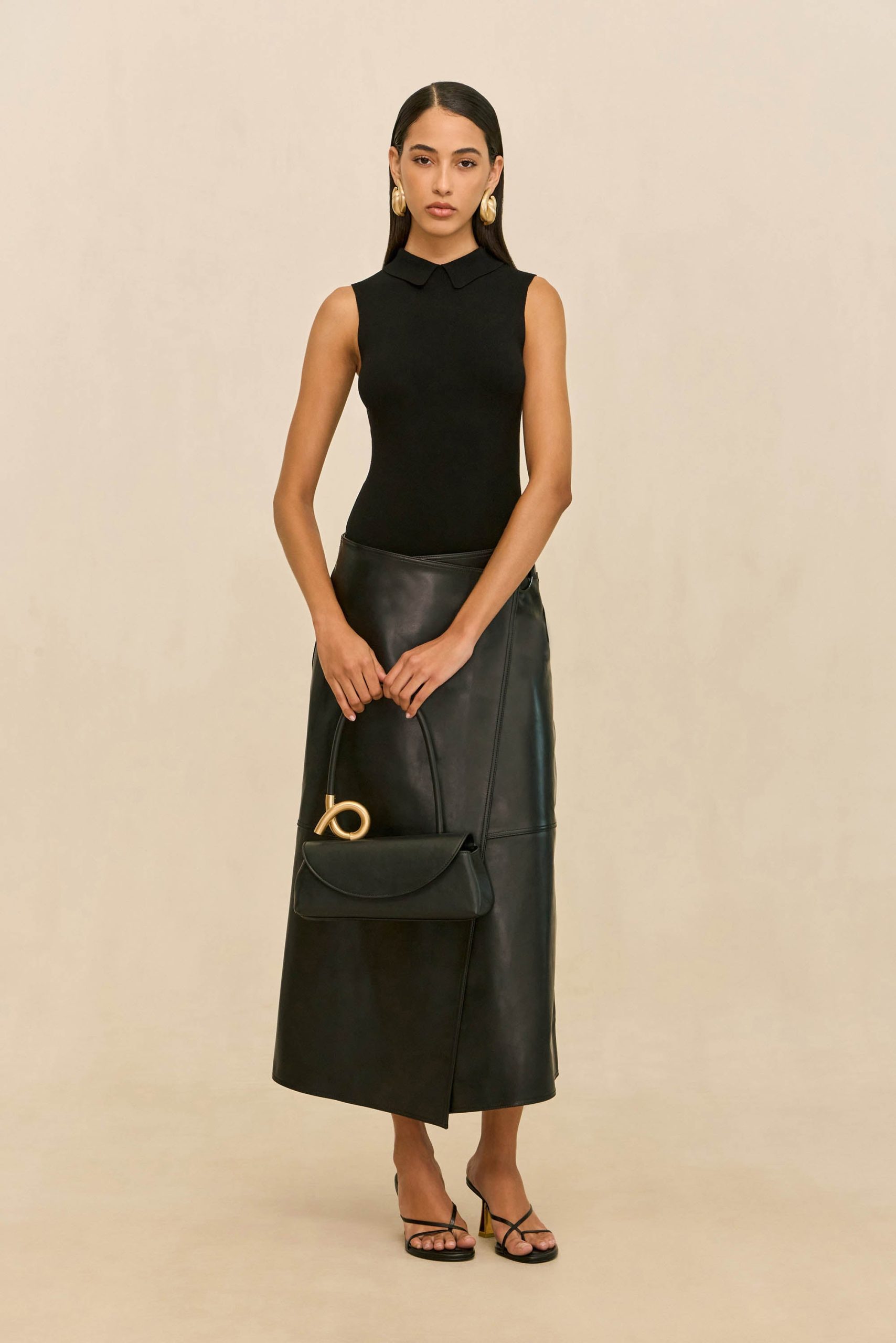 260421_DR_CG_ECOM_RSHTS_34_MYKO_KNIT_BODYSUIT_COSMO_SKIRT_BLK_0013_WEBBED_411d6f5b-76b0-4397-a87f-a21c75f94723-scaled